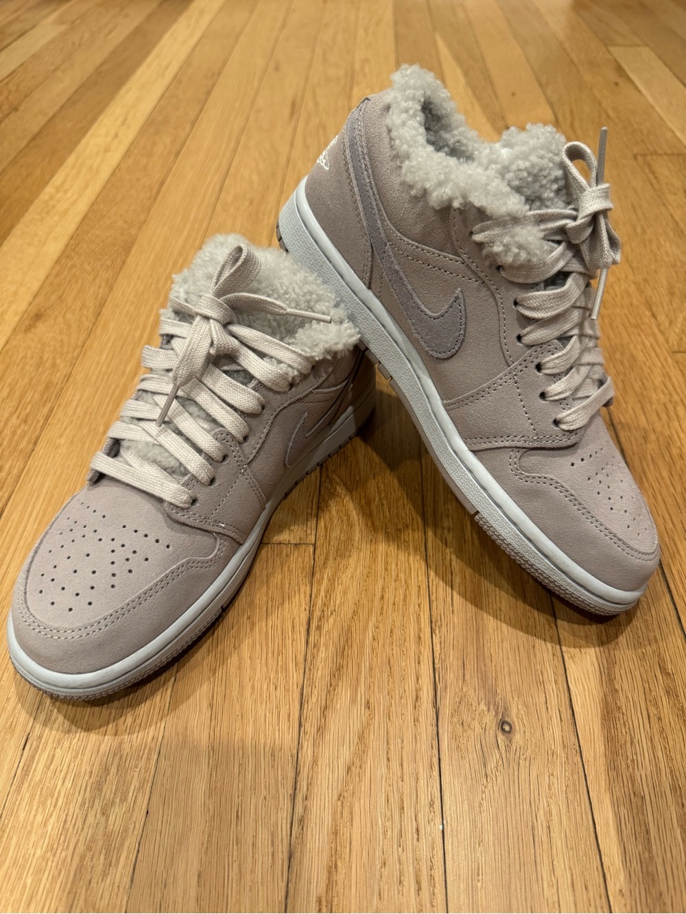 Jordan 1 Women's Grey Low-Top Sherpa Sneakers